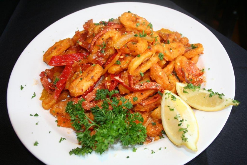 Rhode Island style calamari with pepper rings and lemon